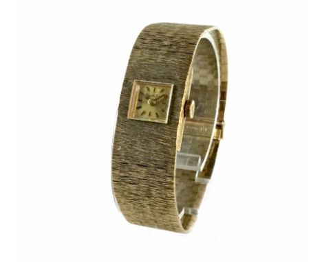LADY'S BEUCHE GIROD NINE CARAT GOLD MANUAL WIND WRIST WATCH, the square gold coloured dial with applied baton hour markers, 1