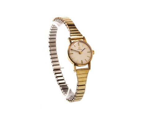 LADY'S OMEGA MANUAL WIND WRIST WATCH, the round buff dial with applied gold coloured baton hour markers, 19mm case, on a gold