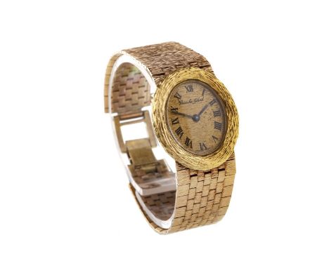 LADY'S BEUCHE GIROD MANUAL WIND WRIST WATCH, the oval textured dial with Roman numerals in black, bark effect bezel to the 24