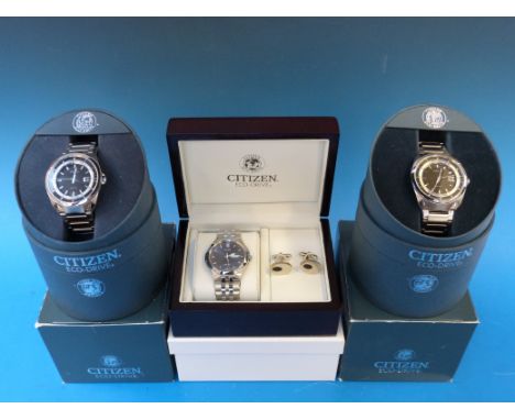 Three Citizen Eco-Drive gents wristwatches, all on stainless steel bracelets, one WR100 set with cufflinks, all in original b