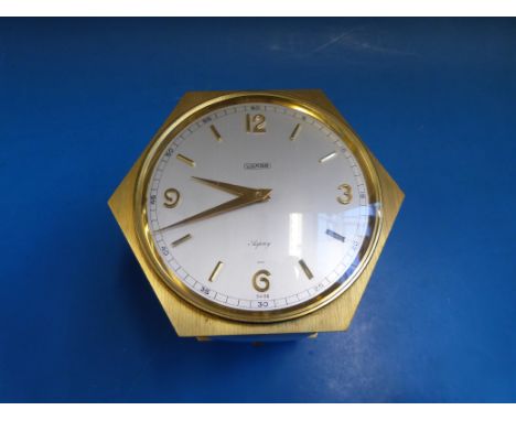 A very unusual hexagonal timepiece compendium incorporating barometer, hygrometer and thermometer on tilting pedestal base an