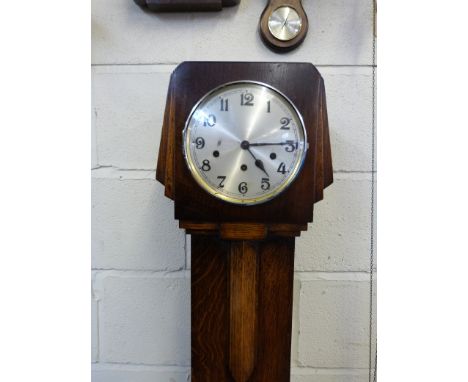 An oak-cased Art Deco three train granddaughter clock c1930 (134cm tall)