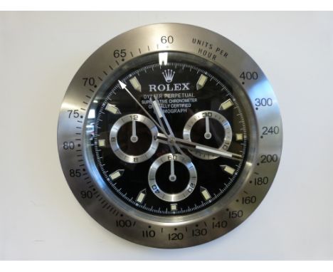 A Rolex Superlative Chronometer advertising clock