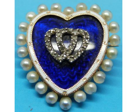 A heart shaped mourning pendant / brooch, the central blue guilloché enamel panel set with diamonds forming two hearts in a w