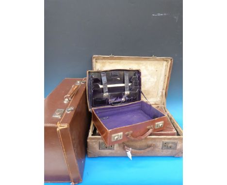 Four various vintage suitcases/attaché cases