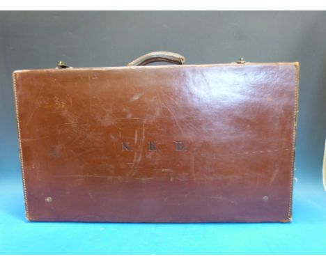 A vintage brown leather suitcase