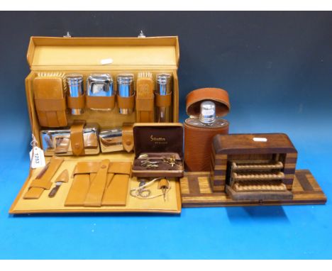 A cased gentleman's vanity / dressing set, flask, cuff links together with an Art Deco cigarette dispenser 