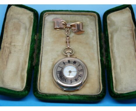 A ladies' 9ct gold cased half hunter fob watch (with bow pin hallmarked Chester) in vintage presentation case