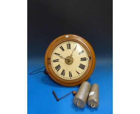 A weight driven wall clock with Black Forest movement, alarm mechanism and painted dial