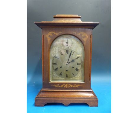 A three train bracket mantel clock with Westminster chime, silvered dial with strike/silent facility, inlaid case, Gustav Bec