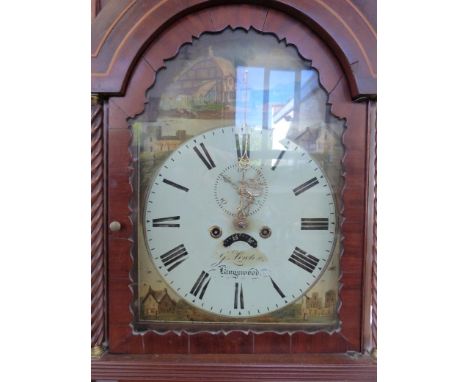 An early to mid-19thC mahogany longcase clock with boxwood string inlay and hood topped by three brass eagles mounted on orbs