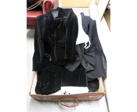 A collection of vintage clothing including Austin Reed dinner jacket, trousers, velvet suit, tails, jacket etc all in vintage