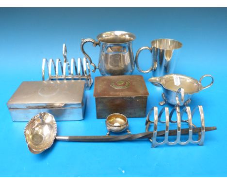 A hallmarked silver cigarette box, silver salt, a silver coin inset ladle, plated mugs, toast racks and a brass box with Arts