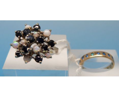 A 9ct gold ring set with opals and sapphires in a cluster design (size M) together with another yellow metal ring marked 9ct 