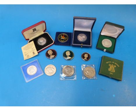 A silver proof 1979 50 pence piece together with a quantity of coins including Elizabeth II enamel examples, dollars etc