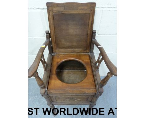 A carved oak commode (width 47cm, depth 45cm, height 86cm)
