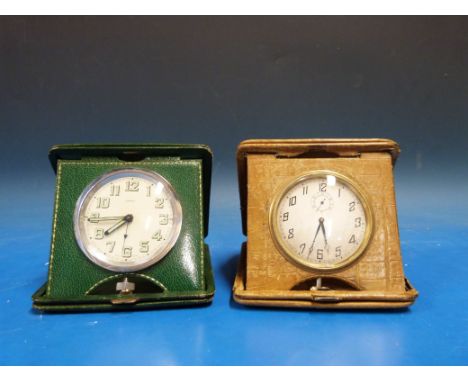 Two vintage travel clocks, one by Brevet