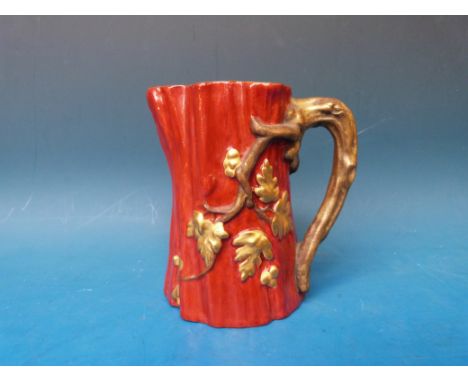An aesthetic period Royal Worcester jug with applied decoration with handle in the form of a vine