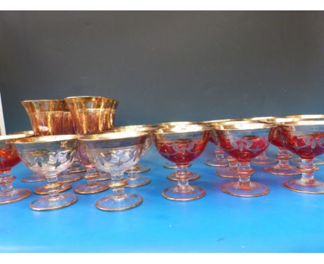 Twenty two SC Line Italy glasses and dishes comprising a set of ten ruby glass sundae dishes, a set of six clear glass sundae