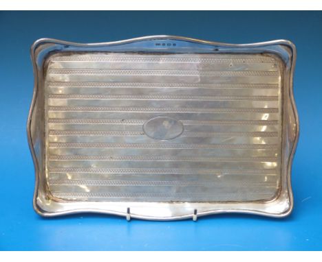 A hallmarked silver tray with engine turned decoration (B'ham 1938) maker's mark D & S,  29cm long (405g)