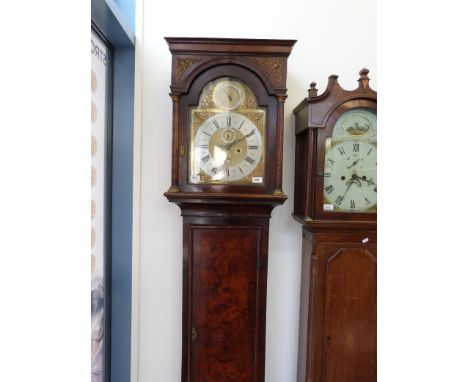 An early 19thC long case clock with eight-day movement and brass dial with silvered chapter ring signed Jas. Harmer, London. 