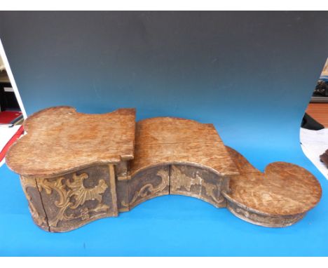 A display plinth stepped shelf with gilt decoration and oak top