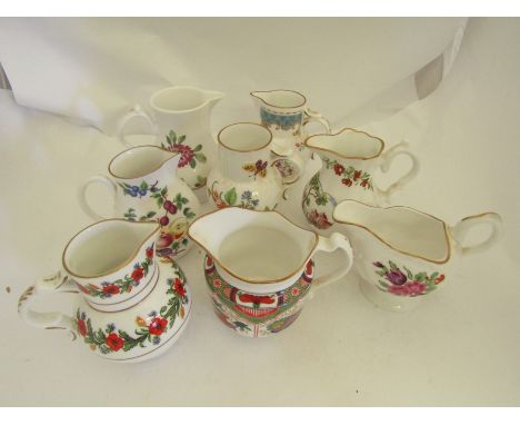Eight assorted modern Worcester jugs including Sparrow beak examples 