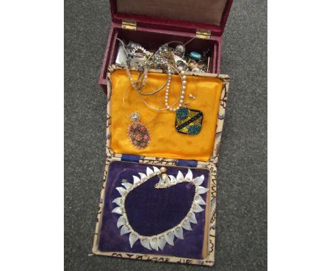 A box of bijouterie including crystal bead necklace, cat brooches, mother of pearl "leaf" necklace etc 