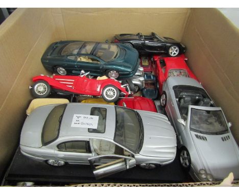 A collection of mainly 1:18 scale diecast sports cars