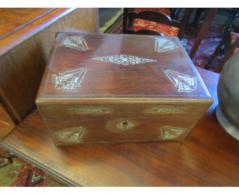 A Victorian rosewood mother of pearl inlaid vanity box with fitted interior 