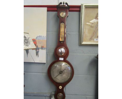 A Victorian mahogany cased barometer with five dials, silvered and brass