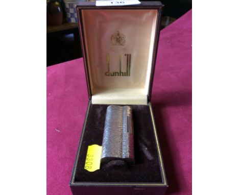 A Dunhill lighter in fitted case