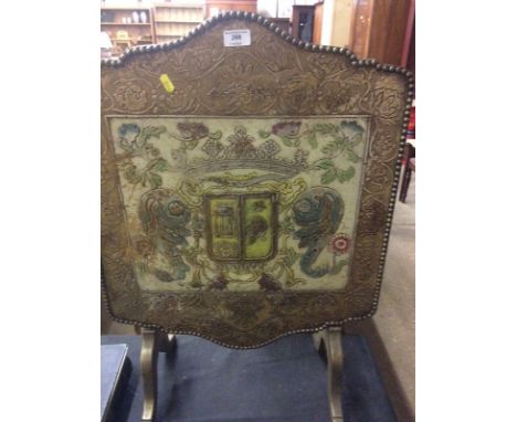 A painted and decorated wooden fire screen 