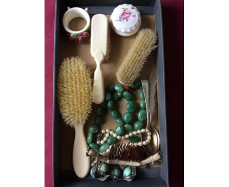 Two silver spoons; a turquoise set bracelet; various dressing table items; a simulated pearl necklace etc.