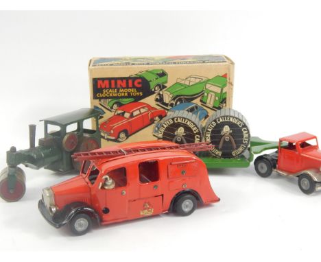 Three Triang Minic toys, comprising a fire engine, steamroller and cable trailer with original Minic scale box.