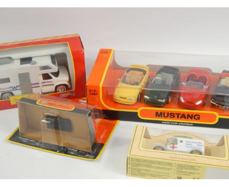 Various vintage vehicles, 1:43 scale die cast vehicles, to include Model T van, etc., (a quantity).