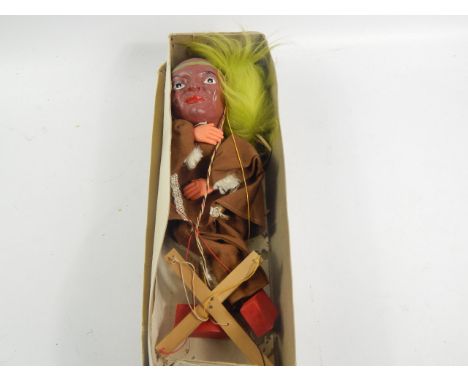 A Barnsbury vintage puppet of an Indian brave, boxed.