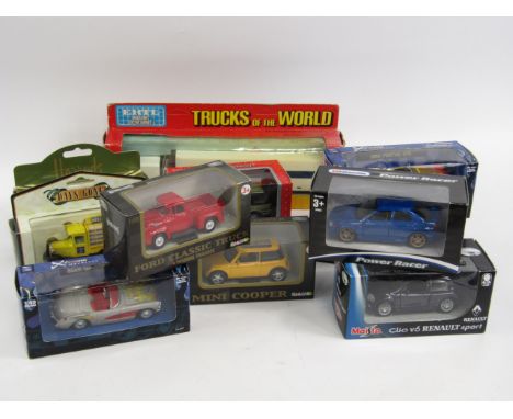 Various die cast vehicles, to include Halsoll Ford Classic truck 1:48 scale, Mini Cooper 1:40, others by Cararama, Show Room 