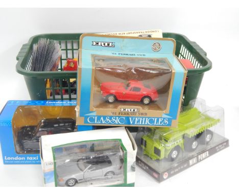 Various die cast vehicles, to include Tesco London taxi, Michelin Peugeot 202 on stand, Coca-Cola lorry, Great British Buses 