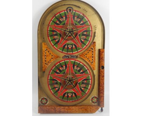 A Lindstrom's Gold Star tin plate bagatelle game, stamped with transfer to the centre, stating Made in USA, with original pac