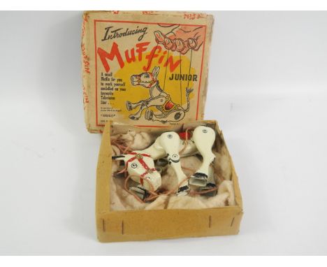 A cast Moko Muffin the Mule junior puppet, boxed