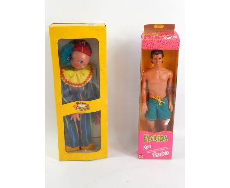 Two boxed toys, a Pelham Puppet clown, SS6, in original box and a Barbie Florida Ken figure (boxed)