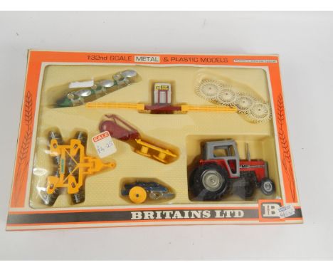 A Britains Limited boxed farm tractor and implements set, to include Massey Ferguson tractor, crop sprayer, etc, no.9592