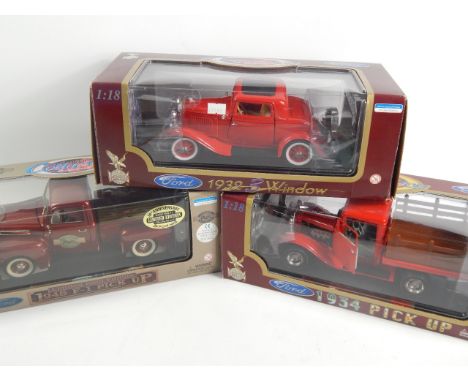 Three 1:18 scale die cast model Ford vehicles, with original boxes.