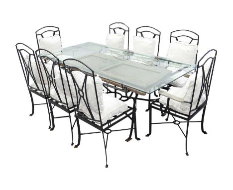 Large rectangular blacksmith-made, black wrought iron garden table, 20th century,  with heavy plate glass top the design inco