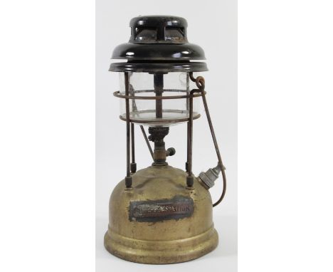 A tilly lamp with brass plaque for Hessle Station