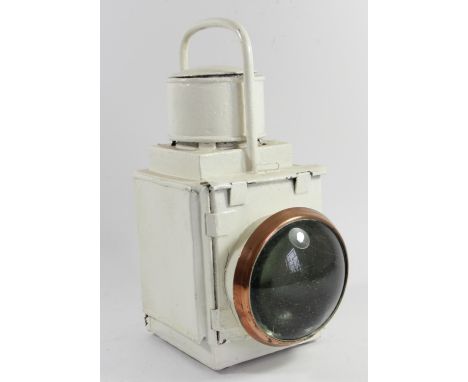 A locomotive headlamp, L.M.S style with brass bezel, no burner. 