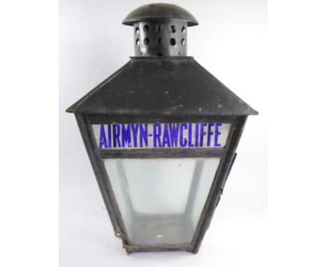 An N.E.R station lamp from the former Airmyn-Rawcliffe station, complete with original glass and wall bracket, 68 x 37 cm. Ai