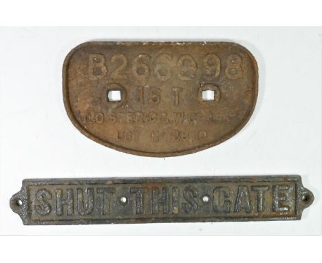 A cast iron wagon plate 'B266998' 16T Gloucester, 16 x 27cm together with a cast iron 'Shut This Gate' sign, 7 x 43 cm (2) 