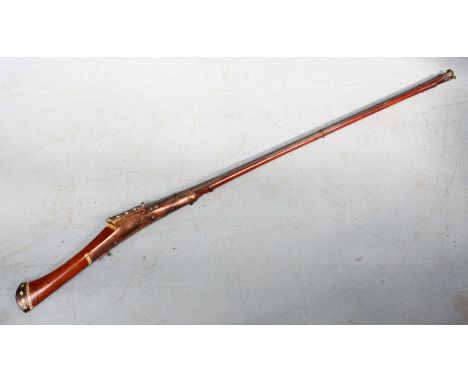 An Indian 'Toradar' matchlock musket, with 50" steel barrel with flared breech and muzzle, finely engine-turned decoration, h